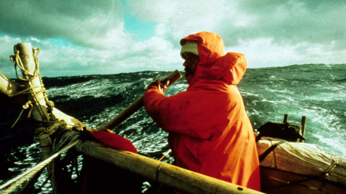 George at helm in rough sea