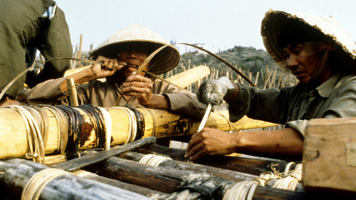 Sam Son fishermen lash the hull together